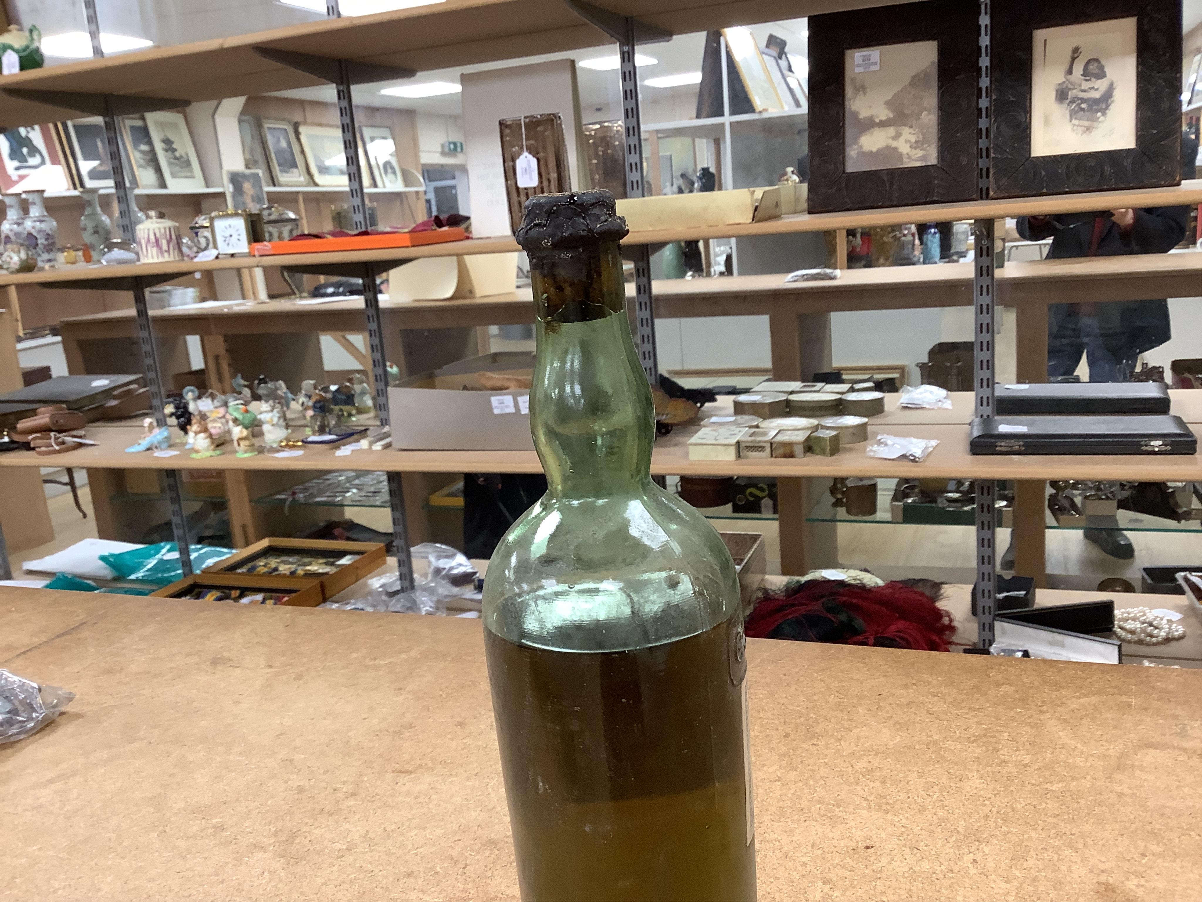 Eight bottles of various spirits and wine. Condition - unknown